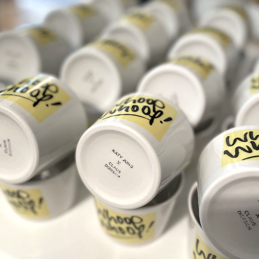 Branding von Claus Dorsch auf einem Becher von feinesweisses